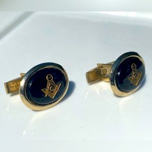 Masonic cufflinks.